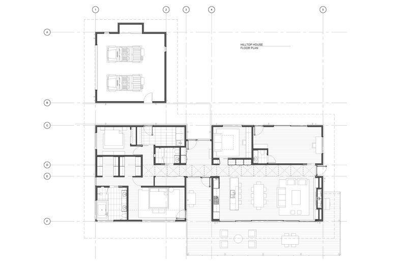 Floor plan drawing showing a residential layout with a detached garage and hillside deck