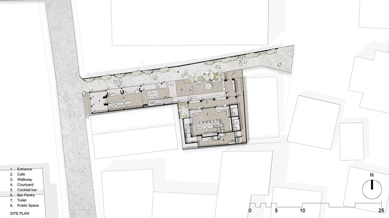 Site plan drawing showing two L-shaped volumes with entrance, cafe, courtyard and cocktail bar areas