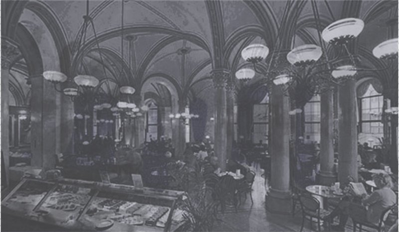 Historic café interior highlighting the architectural richness and social character of traditional coffee house culture.