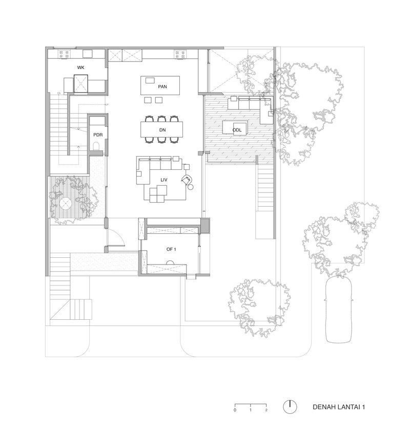 First floor plan showing open living and dining spaces with timber decking and garden courtyards