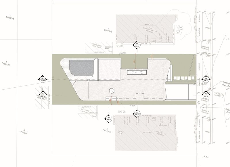 Site plan drawing showing a rectilinear building footprint with pool and courtyard areas on a narrow urban lot