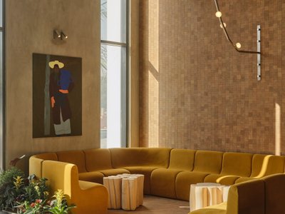 Shell and Core Wrap a 550 m² Al Ain Café in Timber, Concrete, and Courtyard Light