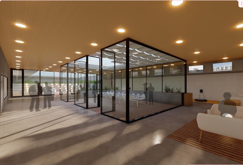 A transparent meeting and critique space framed by glass walls, lounge seating, and strong natural light.