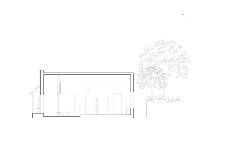 Section drawing revealing the interior volumes with built-in furniture and courtyard greenery
