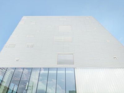 NOTNOT Architects Wraps a Seoul Cultural Hub in a Rhythmic White Louver Skin