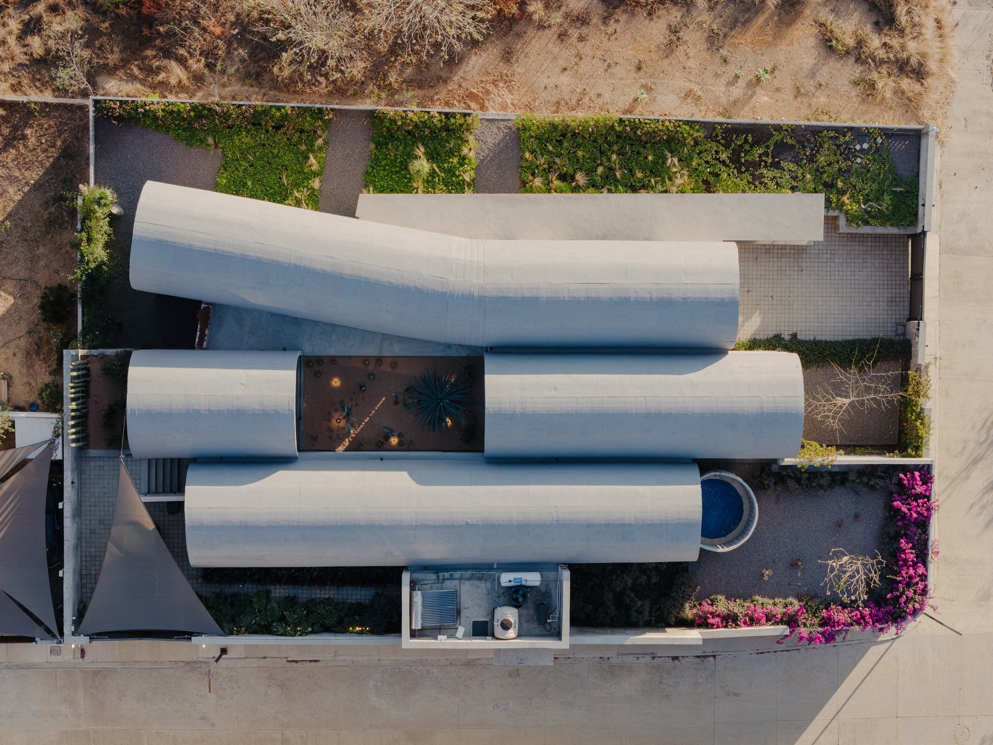 NV/design Architecture Builds a Board-Formed Concrete Home of Barrel Vaults in Oaxaca for Themselves