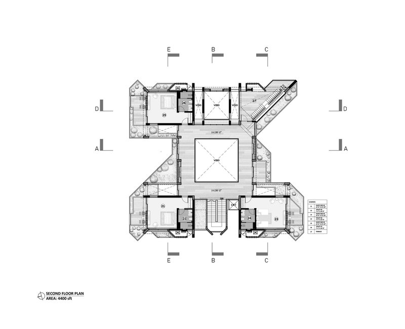Second floor plan drawing showing upper level rooms with balconies wrapping the central void