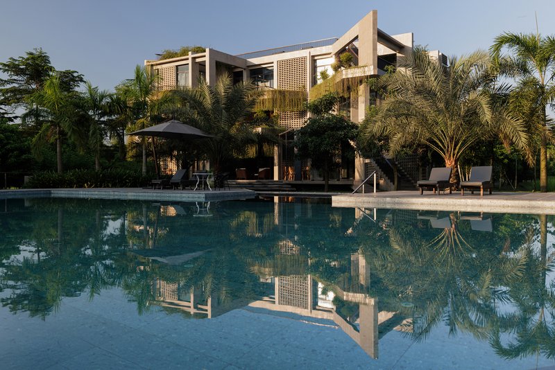 Reincarnation Weaves a Three-Story Retreat into the Green Landscape of Rural Bangladesh