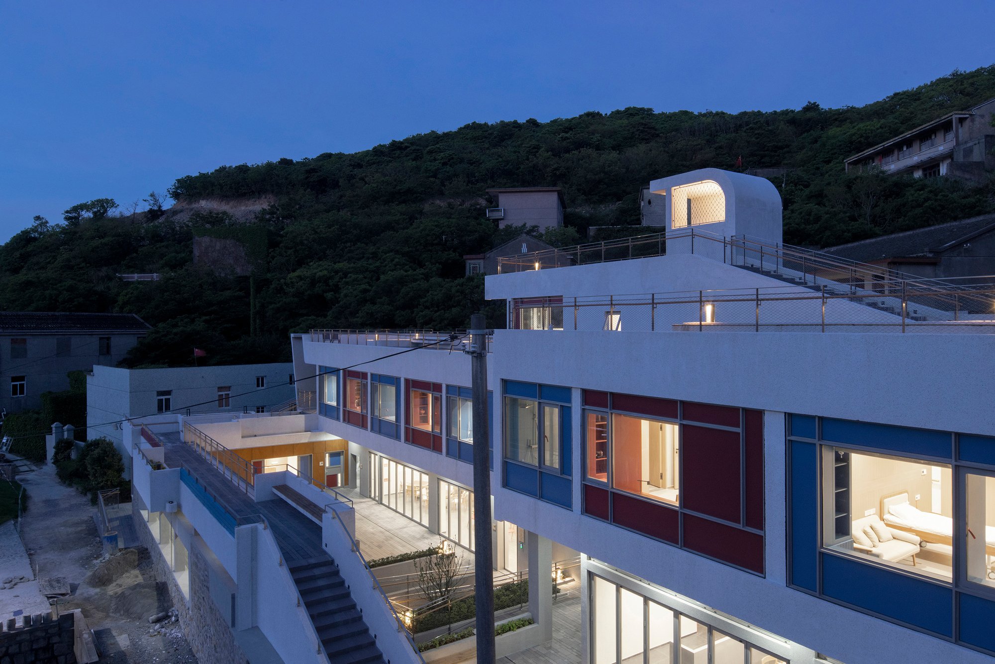 line+ studio Converts an Abandoned Island School into a Floating Care Home for 96 Elderly Residents