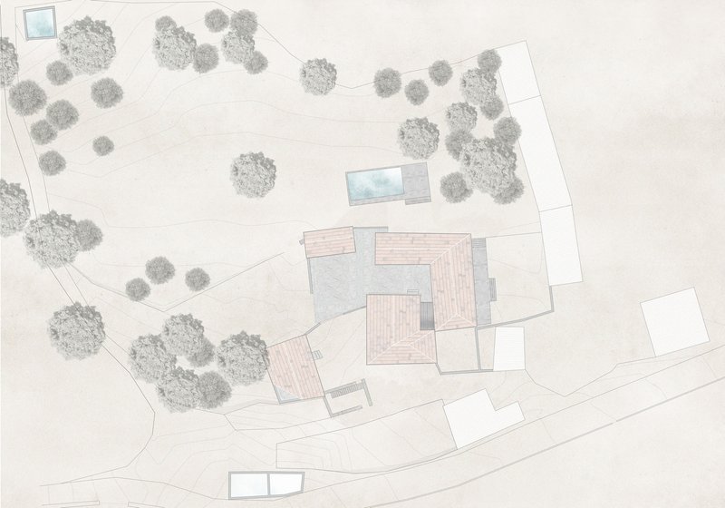 Site plan drawing showing building footprints with tiled roofs surrounded by trees and pathways