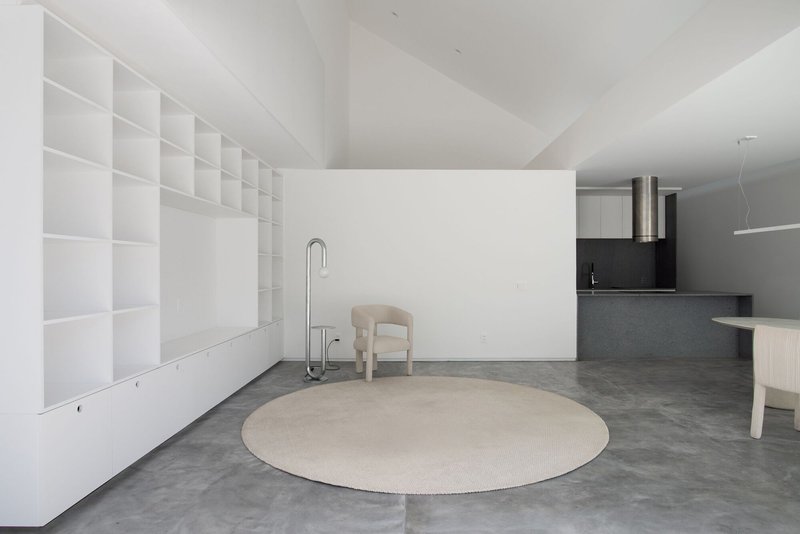 BLOCO Arquitetos Carves Three Cuts into a Narrow Brasília Row House to Shape Light and Volume