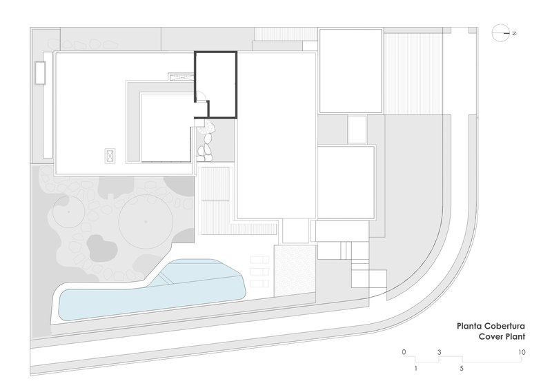 Cover plan drawing showing irregular building footprint with swimming pool and landscaped garden area