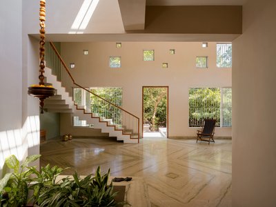 N. B. Architects Nestles a Farmhouse into a Chikoo Grove on India's Konkan Coast