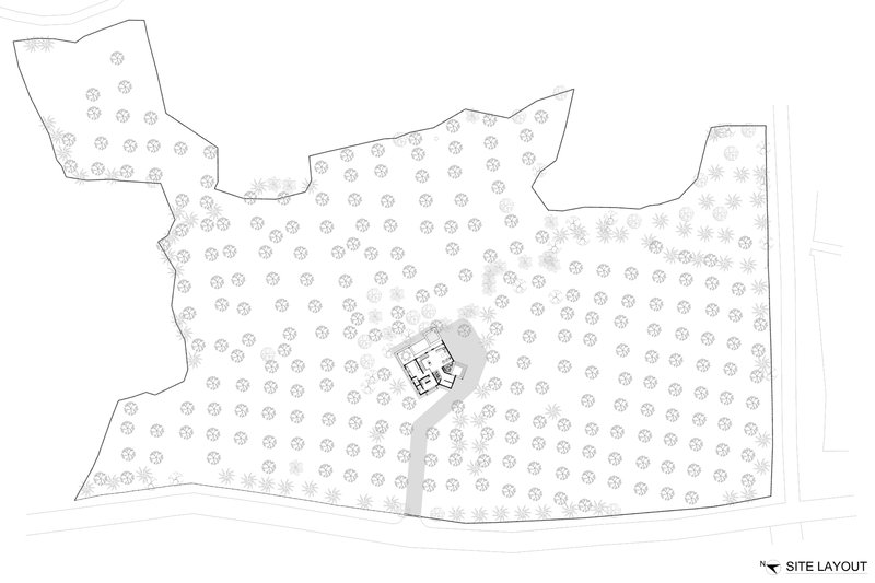 Site layout plan showing a central building footprint surrounded by tree symbols across an irregular plot