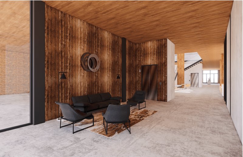 Warm timber lounge creating an intimate pause within the shared co-living interior.