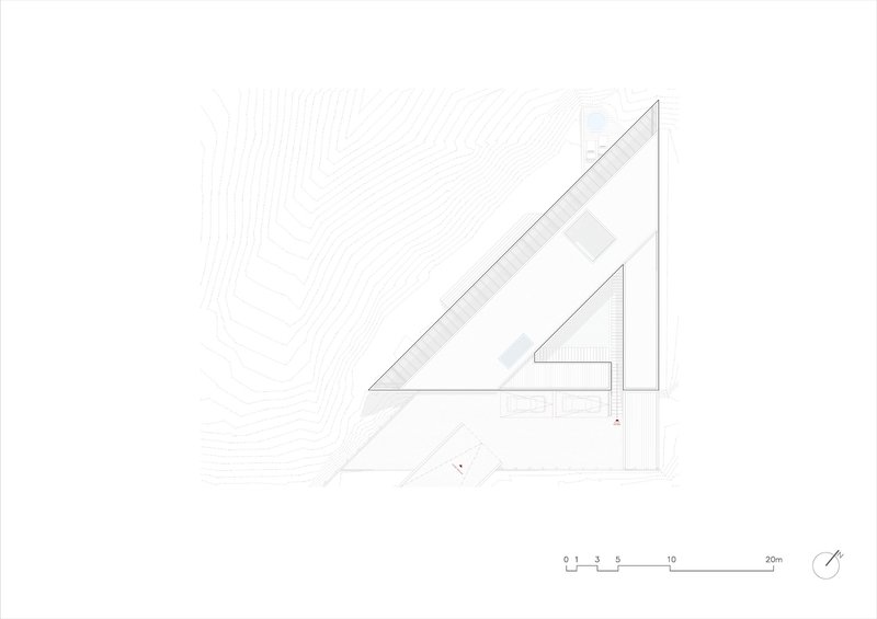 Site plan drawing with topographic contours depicting the angular residence nestled into the landscape