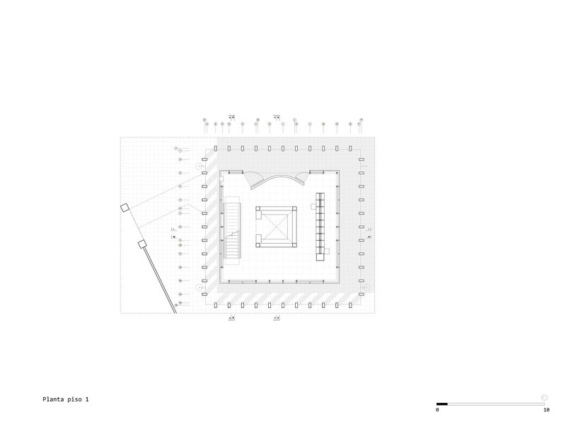 Floor plan drawing showing a square volume with central staircase and angled entry wing