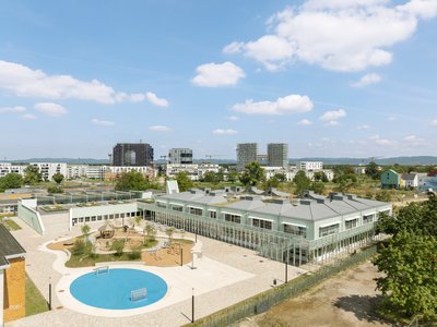 LRO Architects Stack Timber Learning Houses on a Former US Military Base in Mannheim