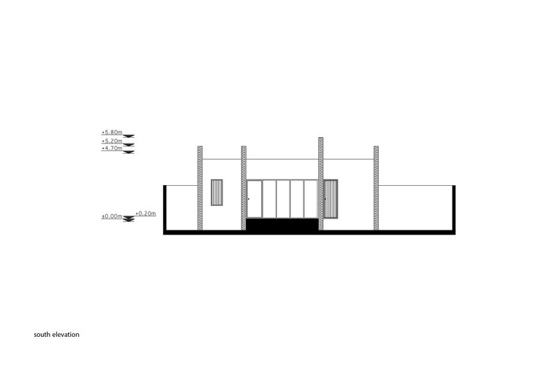 South elevation drawing showing the low-profile building with hatched brick walls and recessed courtyard