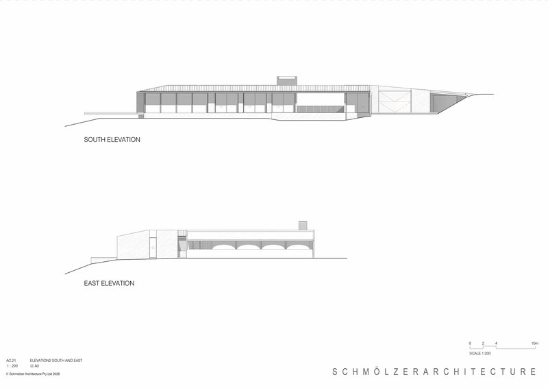 South and east elevation drawings showing the linear building with central courtyard and varied massing