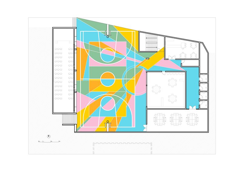 Floor plan drawing showing the courtyard with sport court markings surrounded by interior classroom and stair spaces