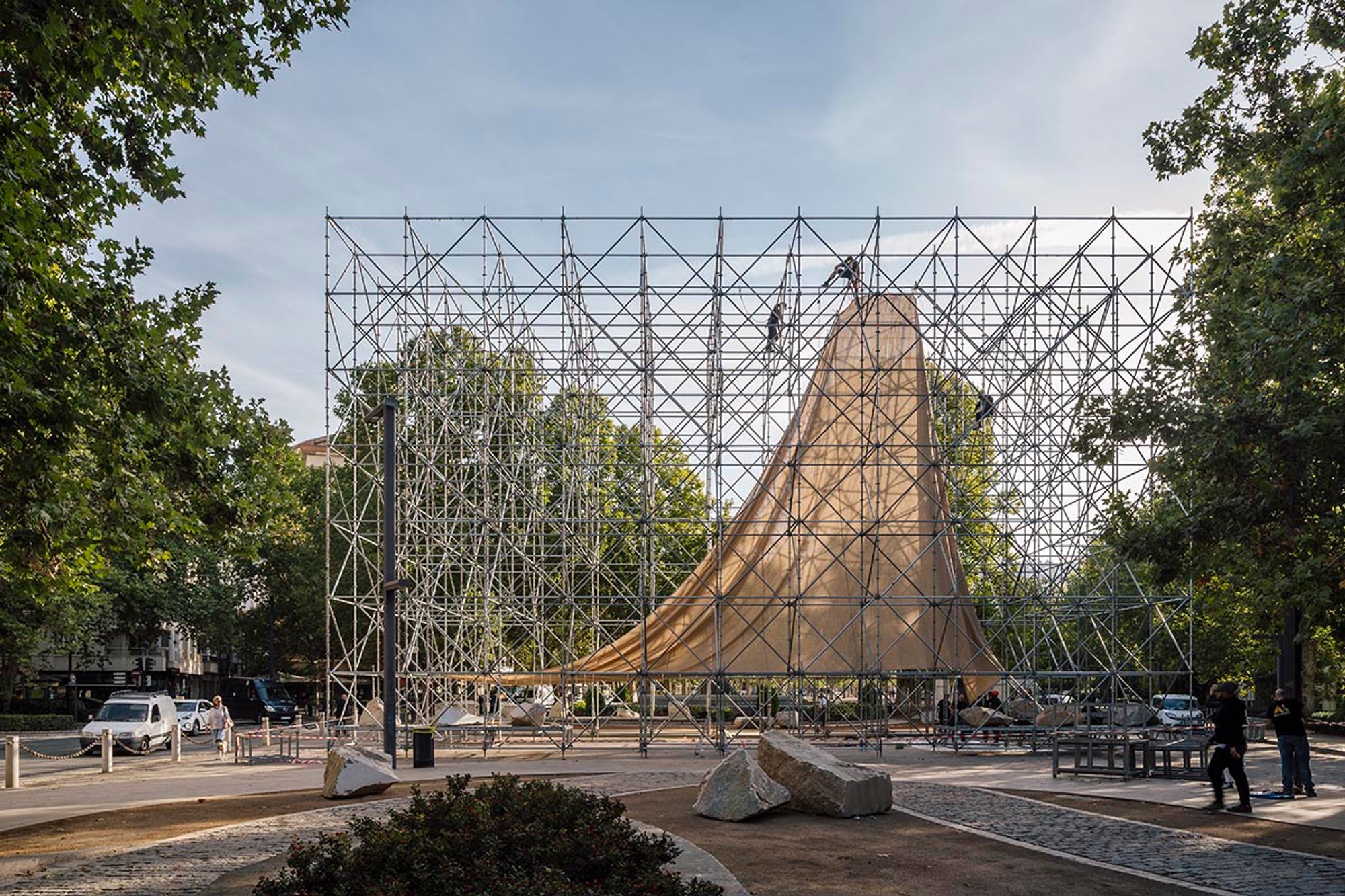 Unveiling the Unfinished Beauty: Giant Scaffolding Wraps Aire Pavilion in Granada, Spain