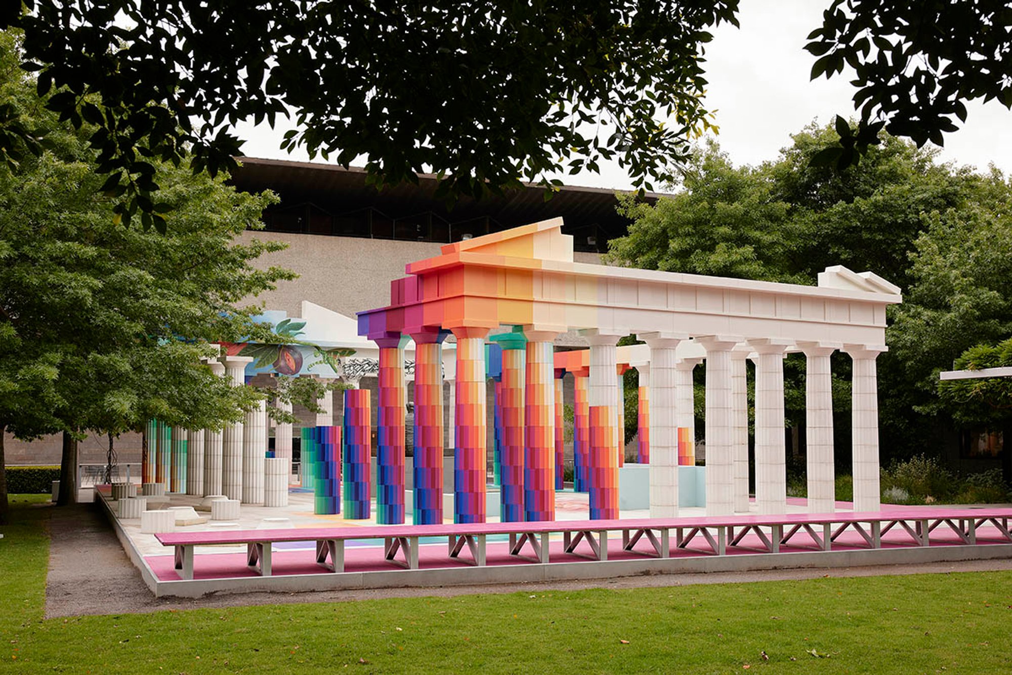 Adam Newman and Kelvin Tsang installed a colorful, mural-clad version of the Parthenon at NGV's Garden.