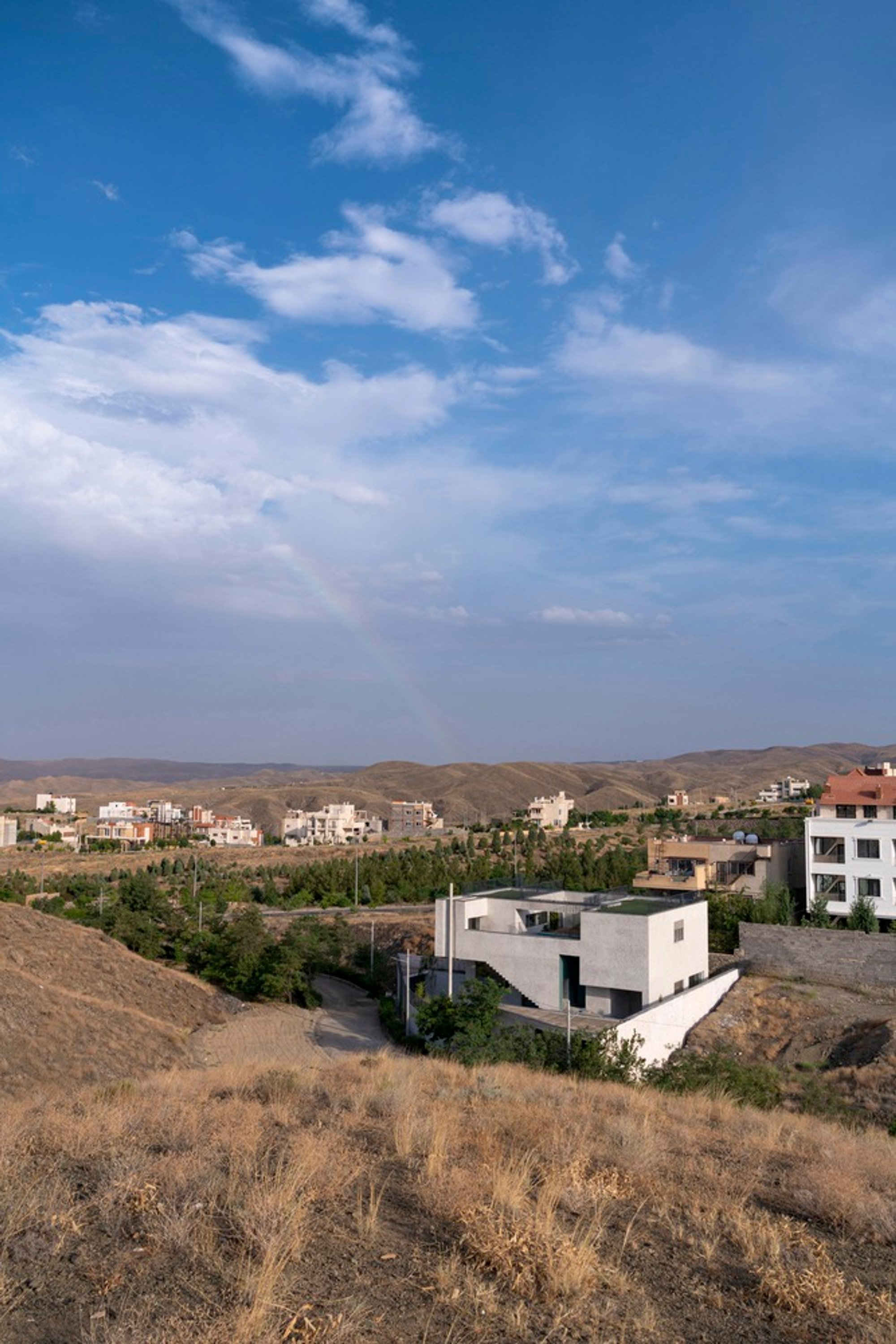 Villa & a Half by WHY Architects: A Contemporary Multi-Generational Home Integrated Into Iran’s Redwood Valley