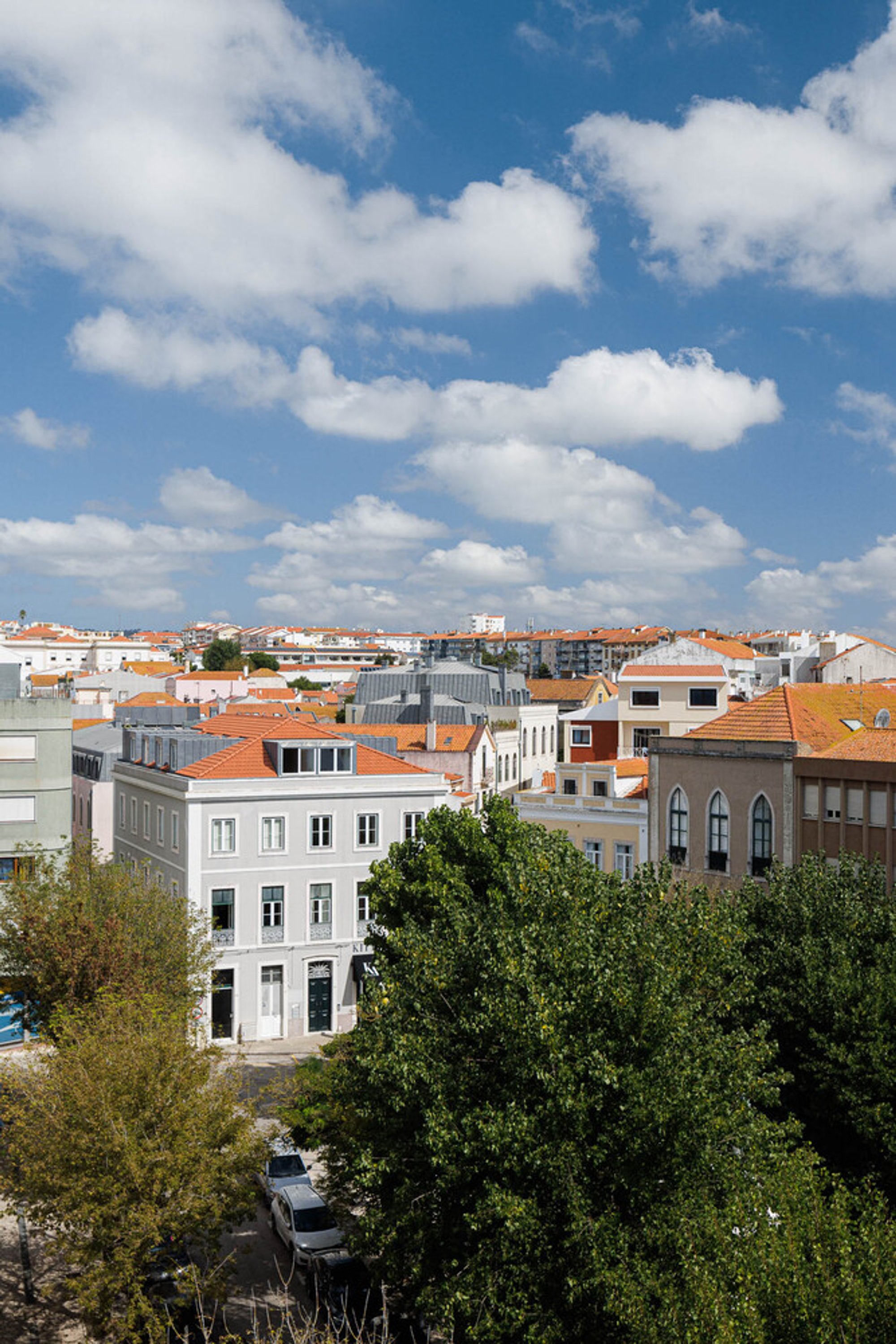 8 de Maio Square Mansards Renovation by Tisem: Historic Preservation Meets Modern Comfort