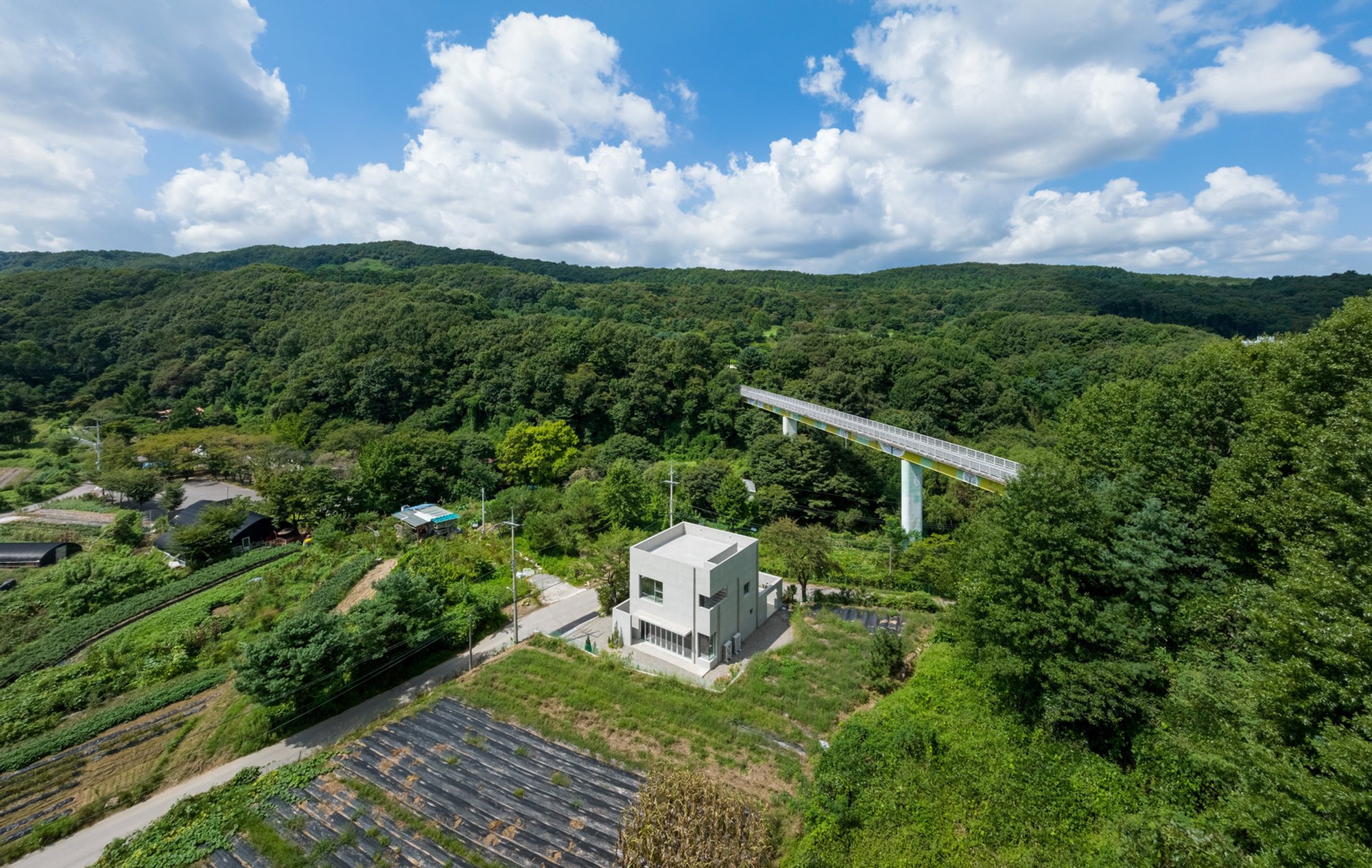 Neungwon-ri Workshop by LIFE Architects: A Concrete Sanctuary for Craft, Community, and Landscape