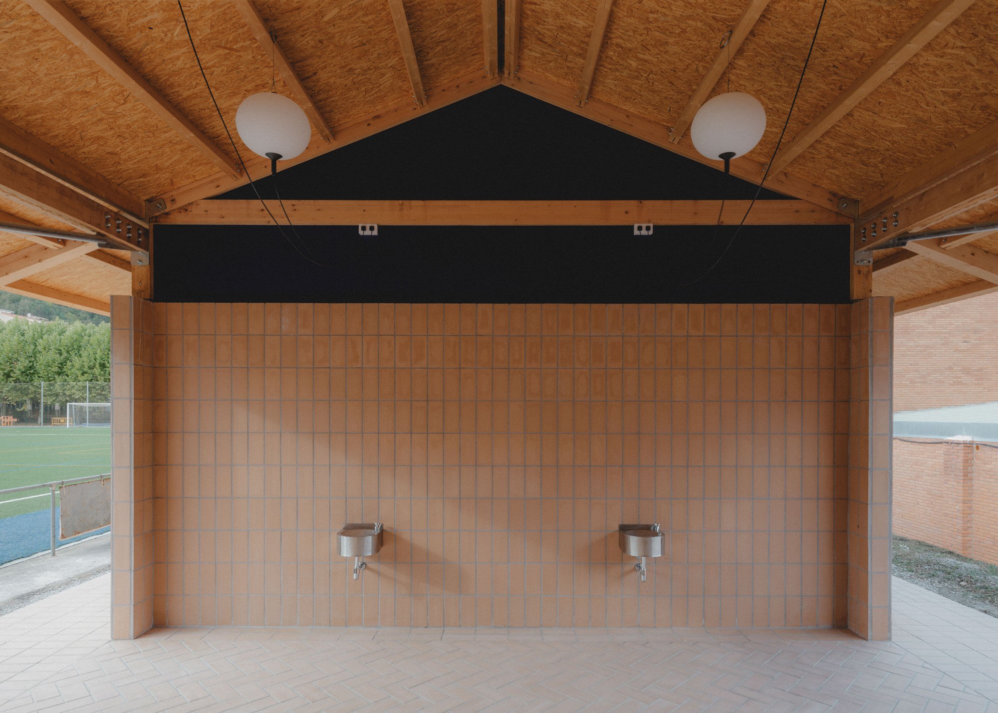 Ripoll – Changing Rooms and a Multi-Purpose Hall by MH.AP Studio + Sergi Serrat