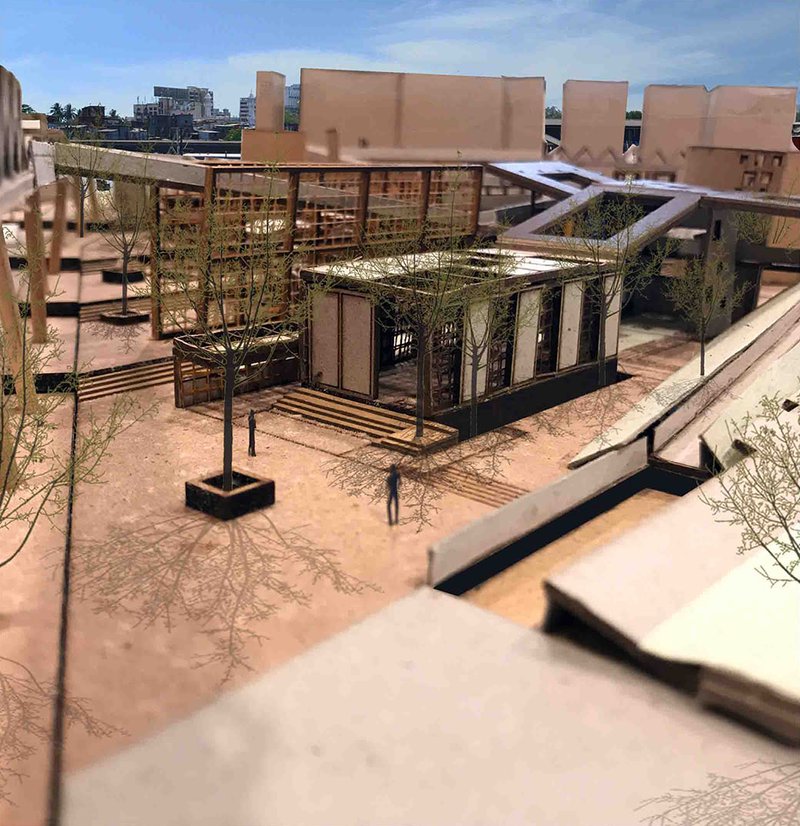 Bird’s-eye view of interconnected pavilions forming a porous social infrastructure within the dense urban fabric.