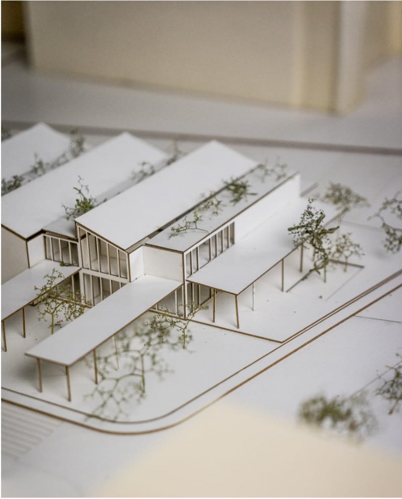 Axonometric model view revealing the internal courtyards and linear circulation strategy enhancing natural ventilation.