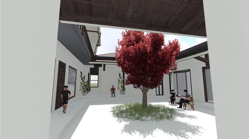Interior courtyard with white paved surfaces centered on a red-leafed tree and figures seated on benches