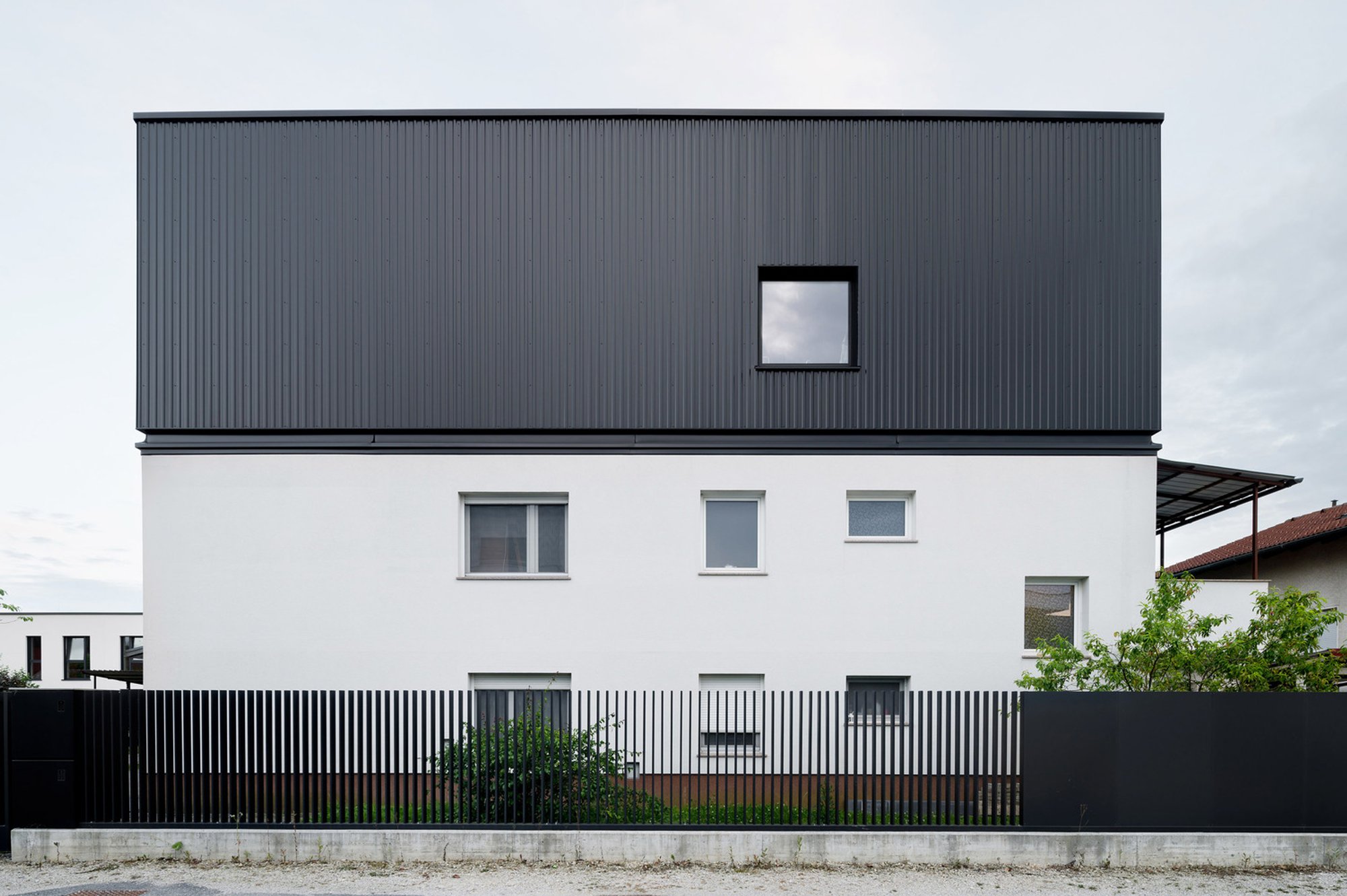 Attic Extension Renovation in Ljubljana by ARHITEKTURA