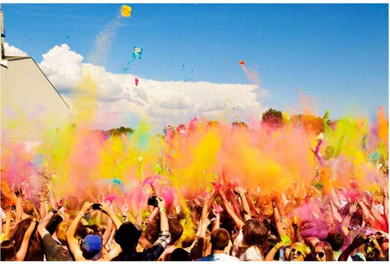 Celebration as spatial catalyst—where color, crowd, and moment temporarily redefine place and identity.