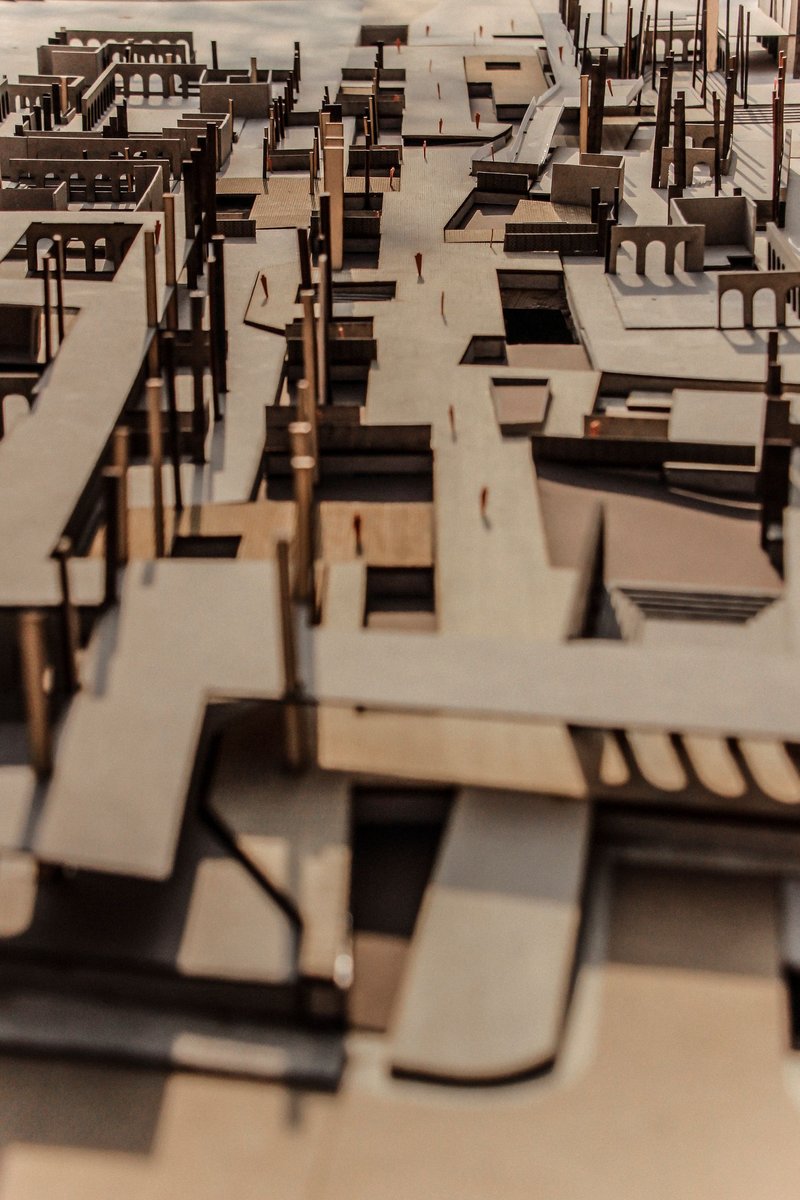 Physical model exploring porous urban fabric and interconnected public realms at the neighborhood scale.