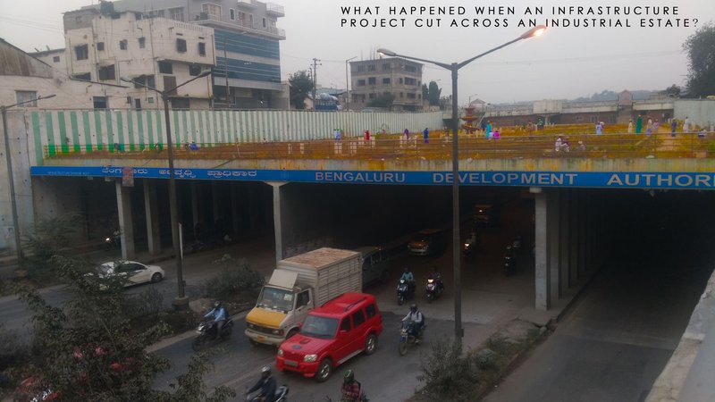 Infrastructure cutting through the urban fabric, creating residual spaces beneath the Outer Ring Road in Bengaluru.