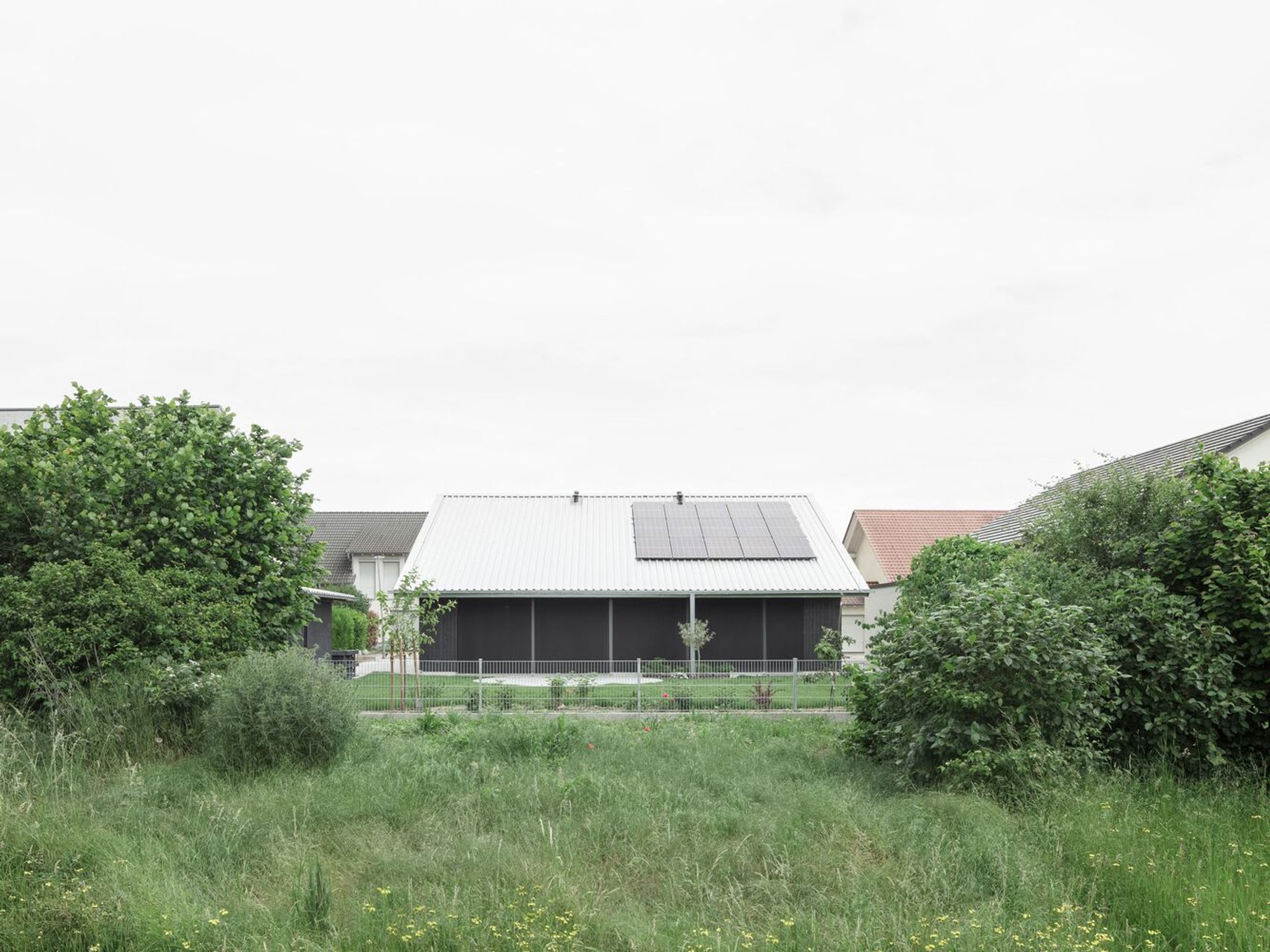 Roofed Square and a Circle Single Family House by Curious About: Innovative Timber Architecture in Germany