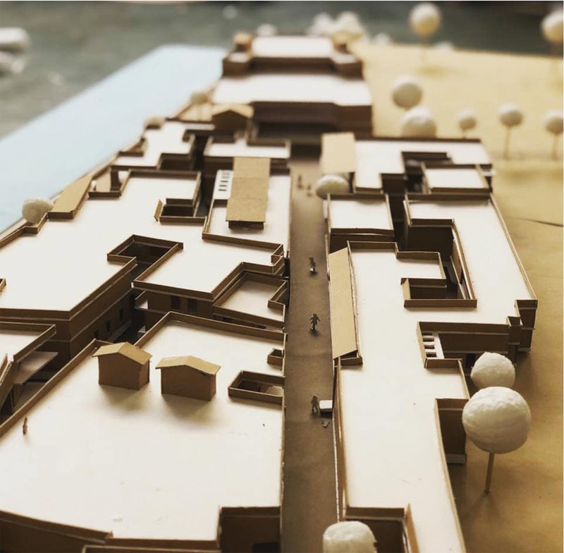 Physical model illustrating the layered street network and public spine of the Civic Engagement Centre, Ahmedabad.