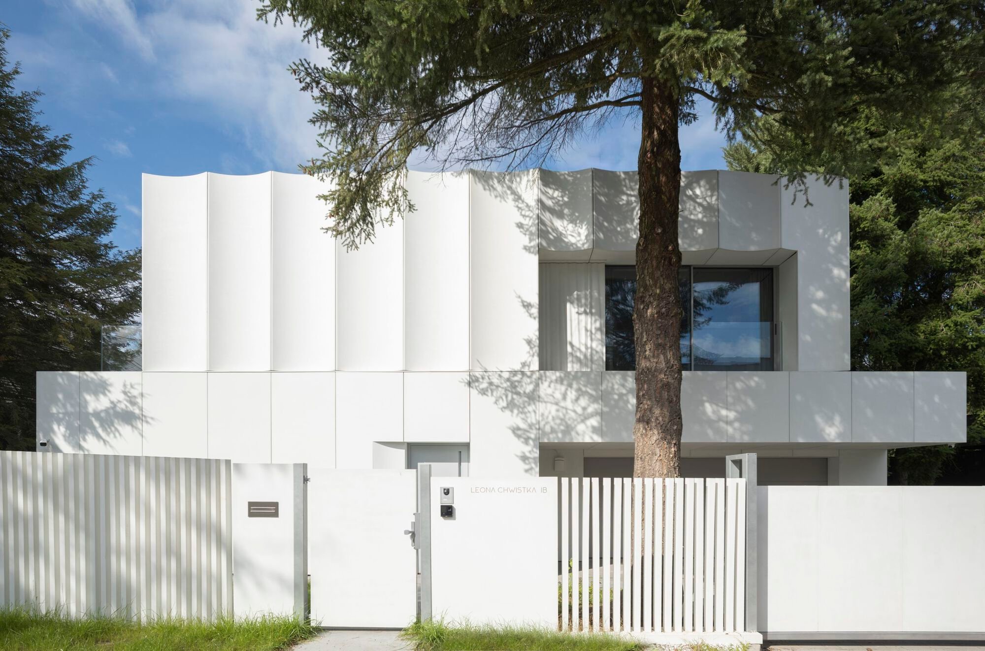 House in White By UCEES