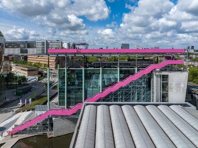 MVRDV Unveils Striking Pink Podium in Rotterdam for Urban Revitalization