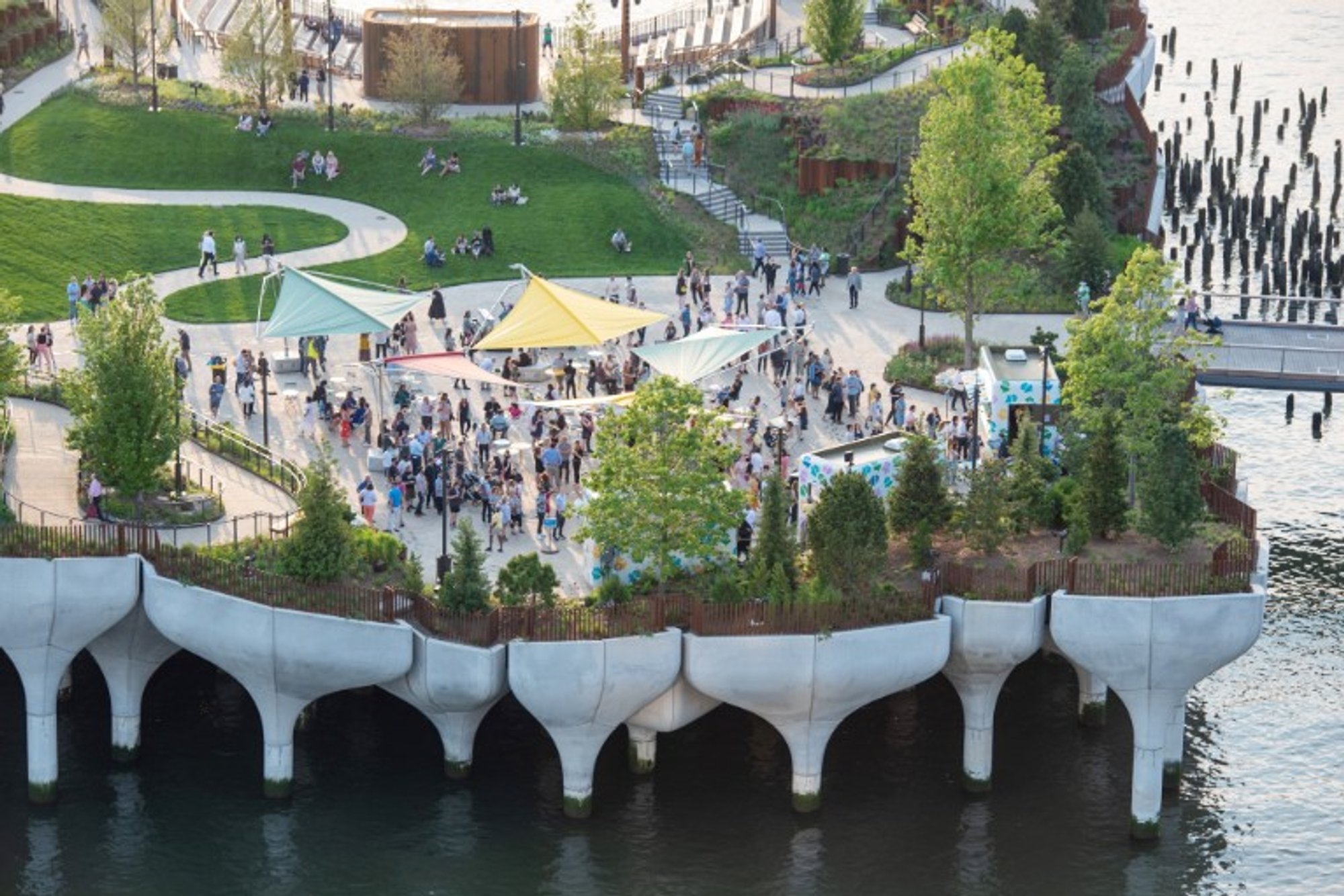 Step into a whimsical wonderland: Little Island, NYC's newest park by Heatherwick Studio, now open to the public!