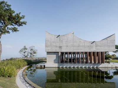 Immerse Yourself in Tranquility at the Watery Oasis of the Watermoon Tea House by Behet Bondzio Lin Architekten