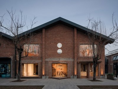 Atelier tao+c Transforms an Old Textile Warehouse into a Stunning Showroom for ZIIN Furniture