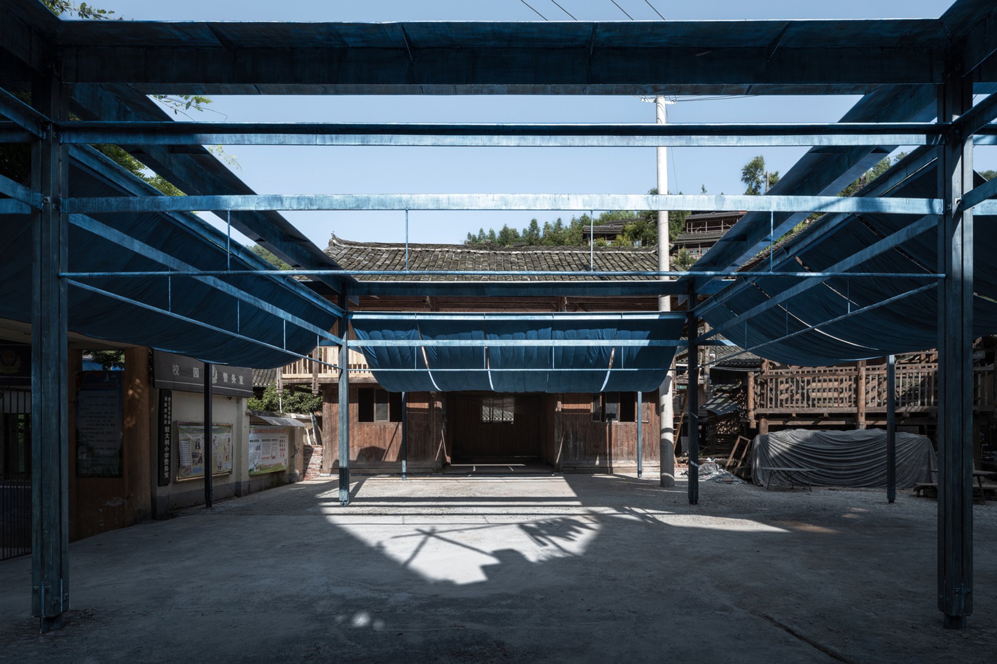 Dong Village Architecture: Exploring the Beauty of Blue Square by Atelier Guo