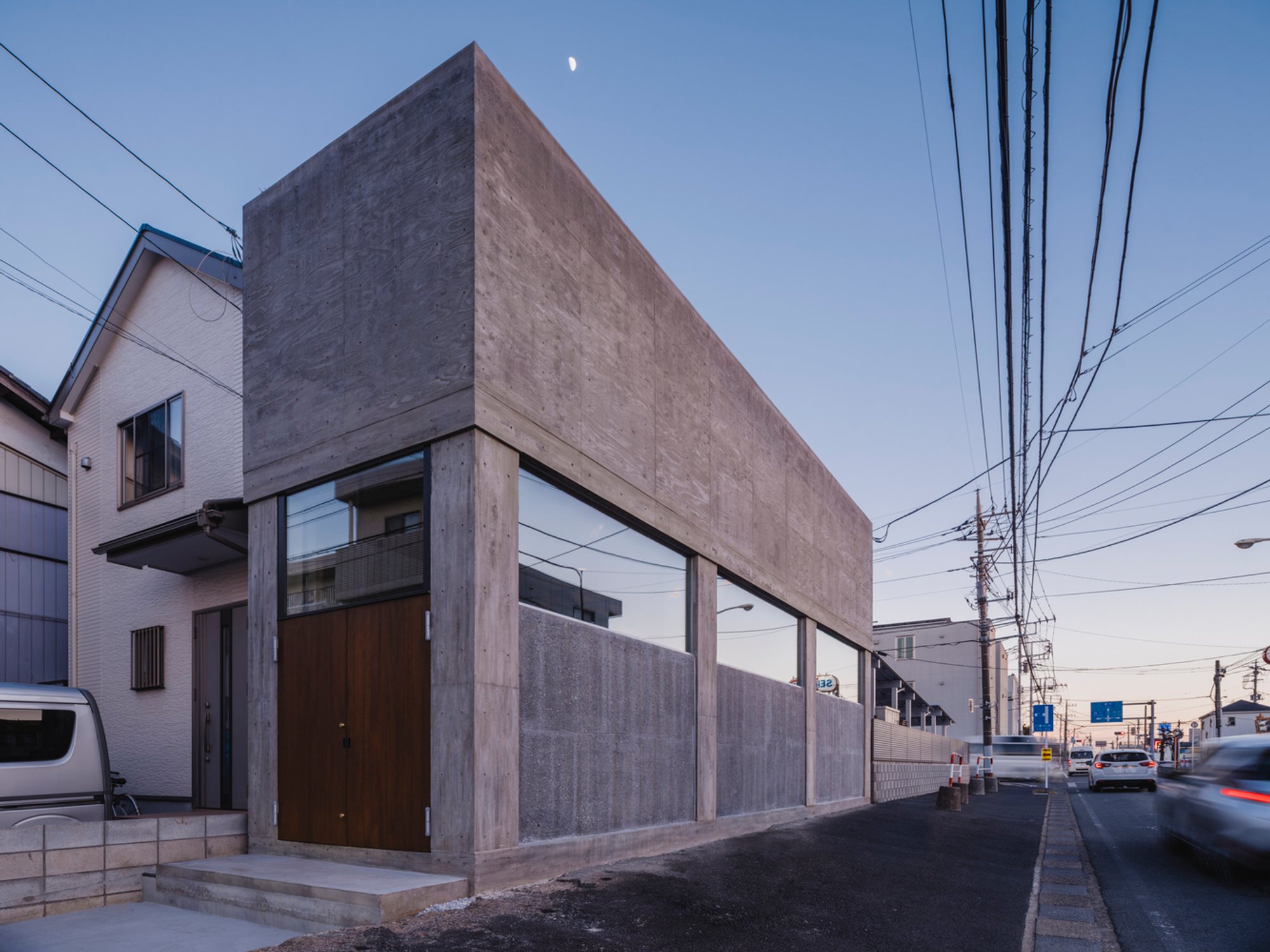 Innovative Urban House Design: Maximizing Space and Light in Narrow Sites