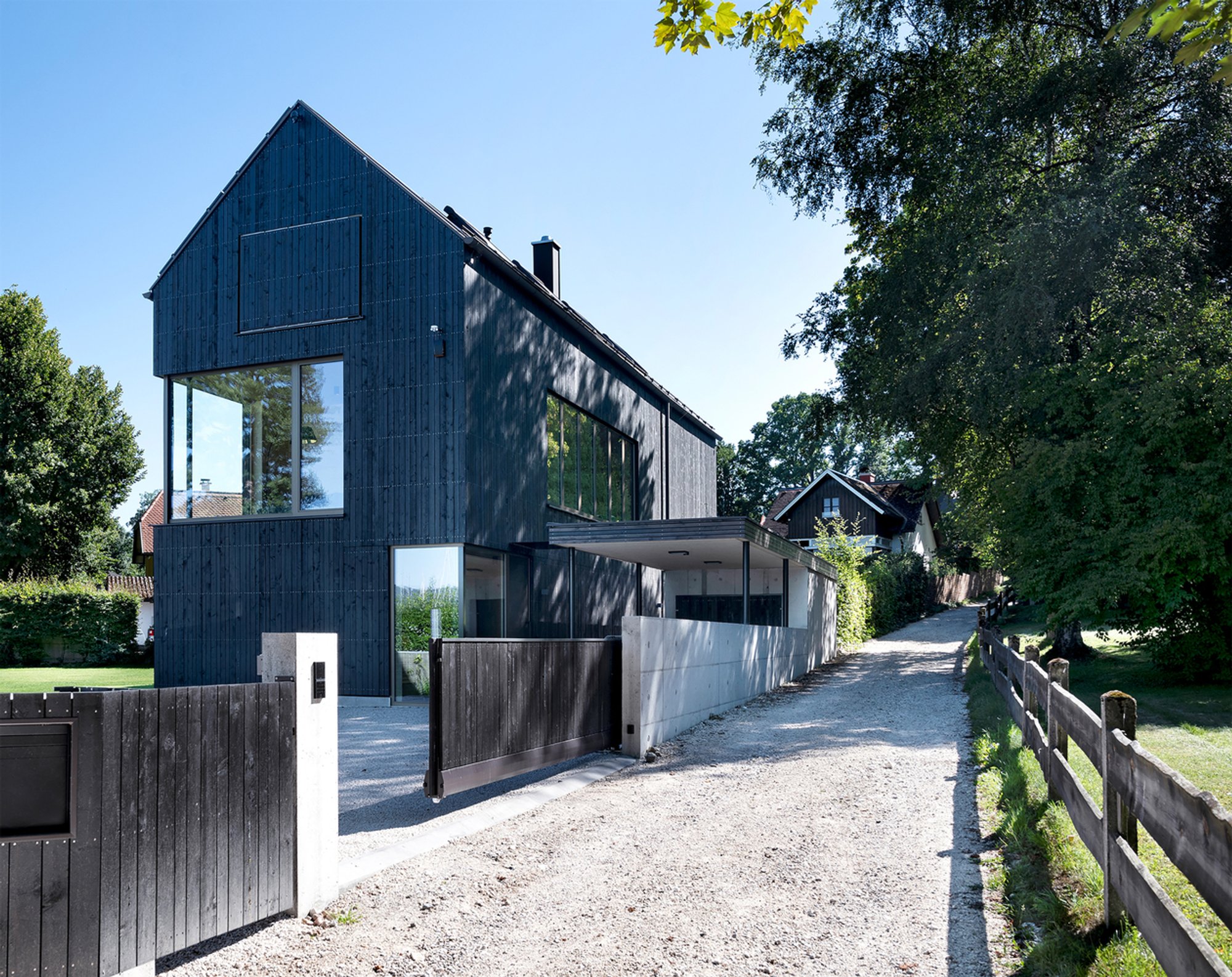 Modern Lakeside Living: House F by bogenfeld Architektur