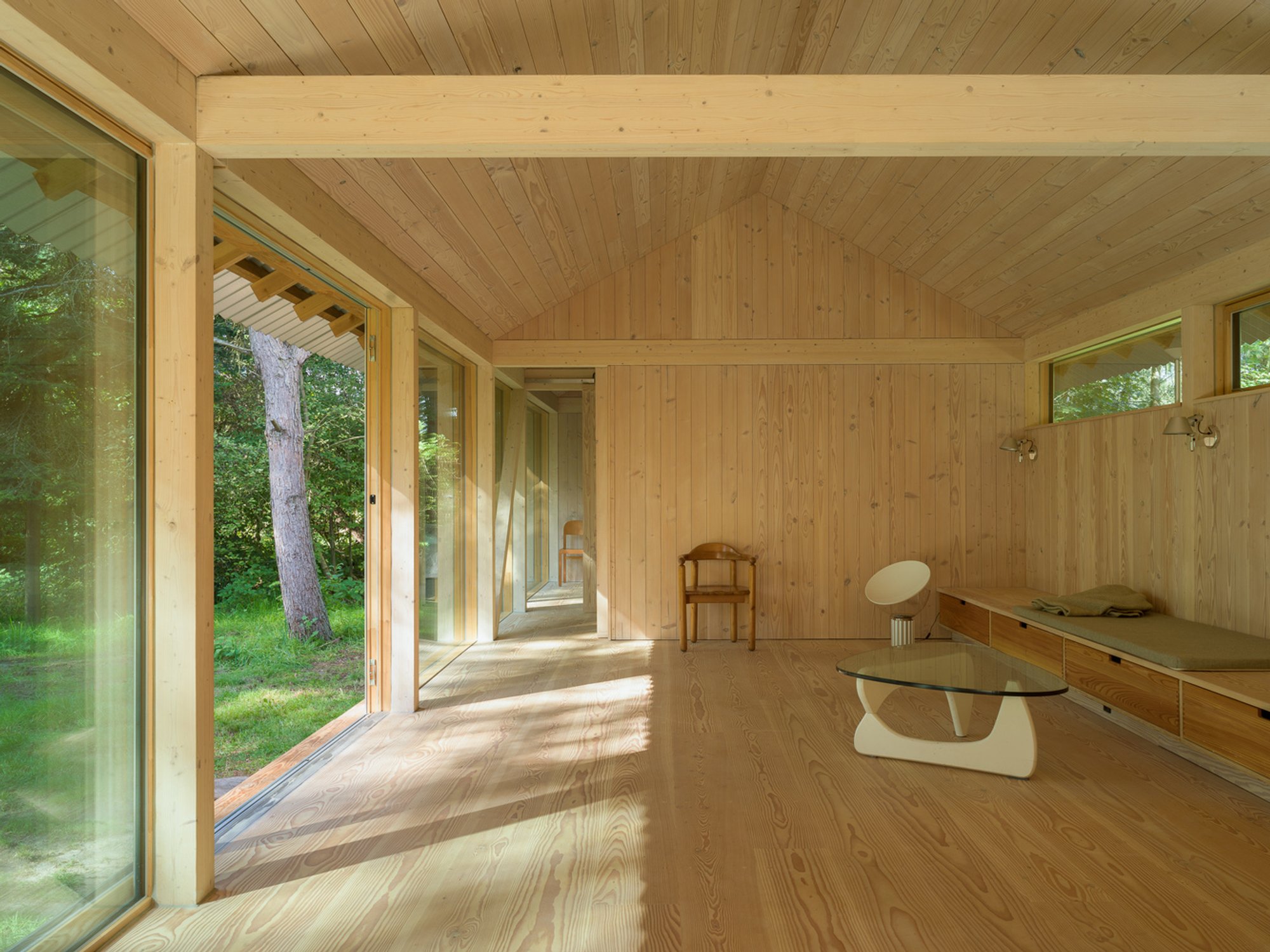 Embracing Nature: The Modern Forest Longhouse Design of Vollerup House
