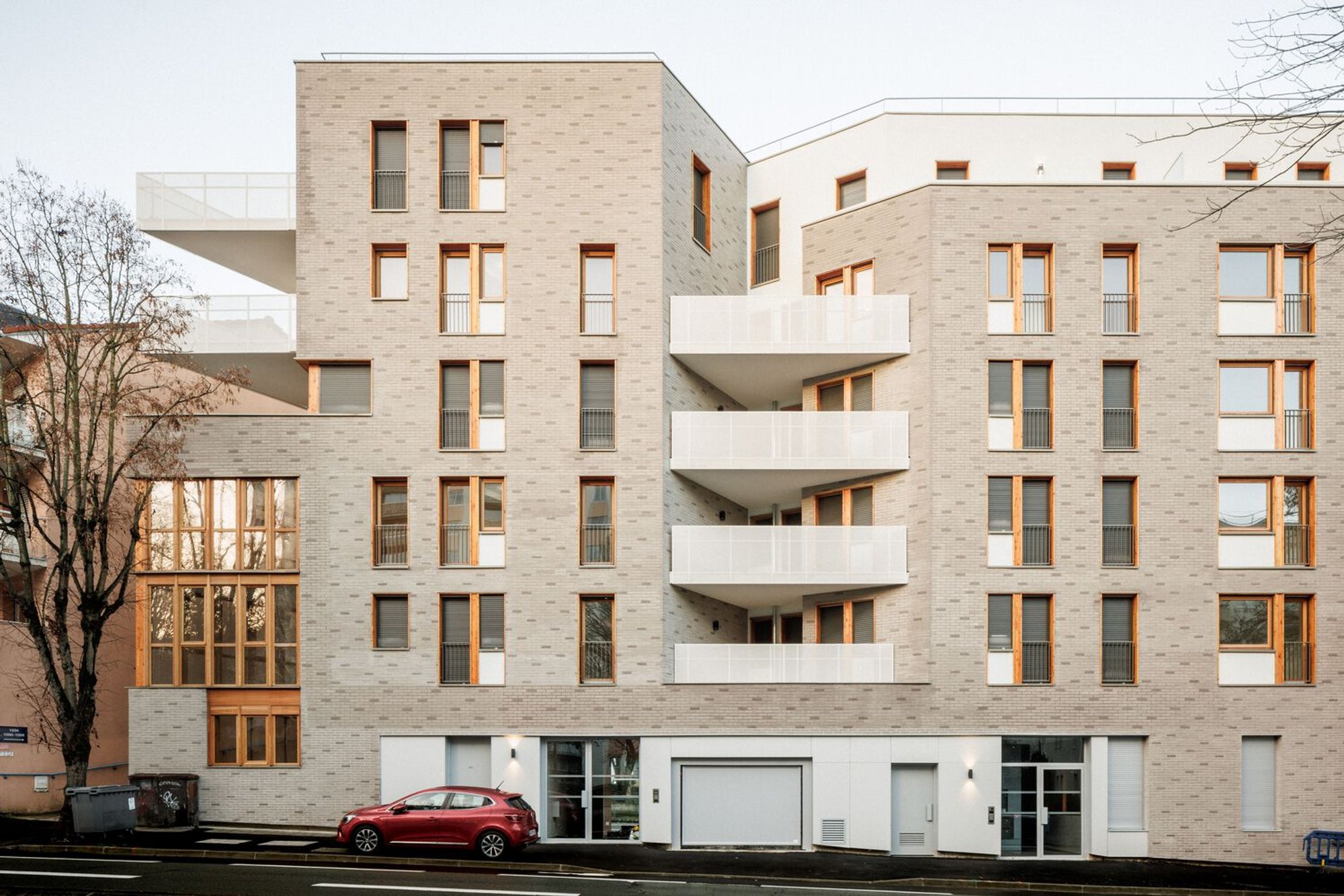 Integrated Social Housing Design: On the Hillside Apartments by AUP/Architectes